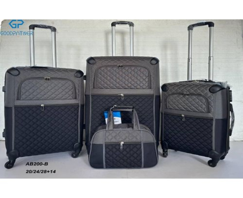 A Set of 4 Piece's Suitcase With Two Layers It Has Rubber And Cloth Material